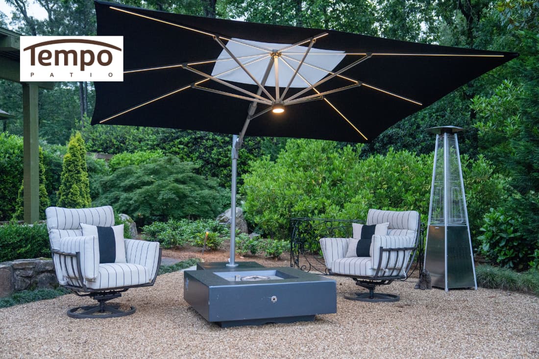 Illuminated cantilever umbrella showcasing movable patio umbrellas for outdoor comfort around a fire table