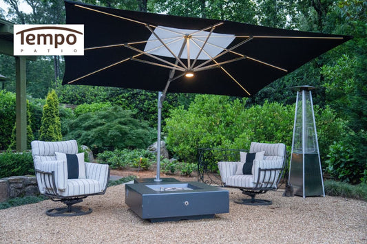 Illuminated cantilever umbrella showcasing movable patio umbrellas for outdoor comfort around a fire table