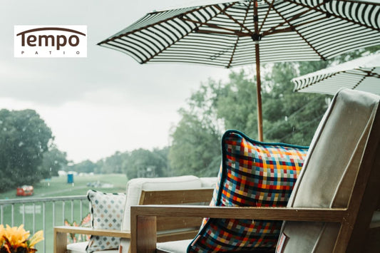 Rainy balcony seating protected by portable umbrellas for apartments and balconies with colorful cushions